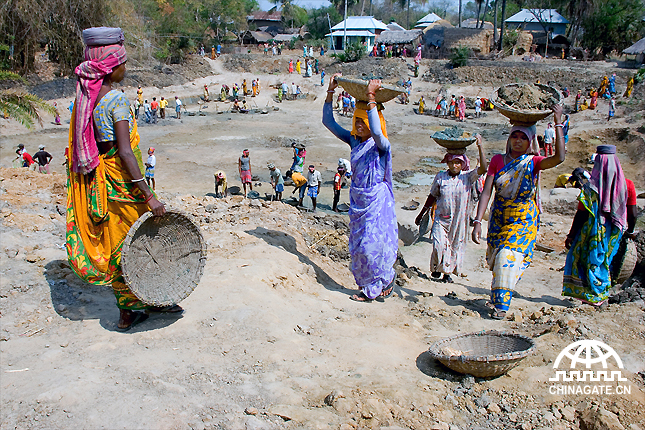 Village people are working in project of digging pond, a hundred days work, which is organized by the Gram Panchyat (Village Head). This project helps villagers from water scarcity in summer and also helps people to earn money.