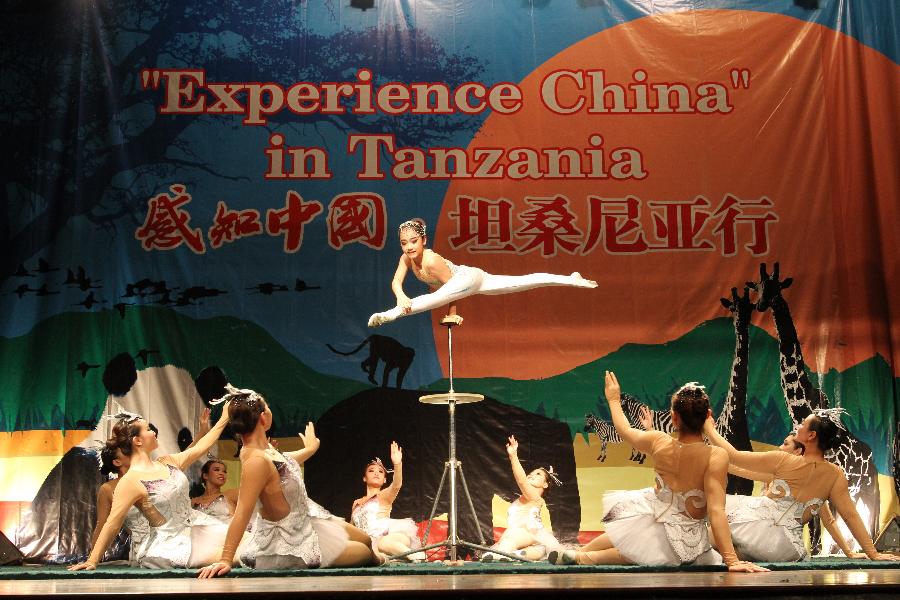 Chinese acrobats perform One Hand Balancing during the show 'Experience China' in Dar es Salaam, Tanzania, Sept. 24, 2012.