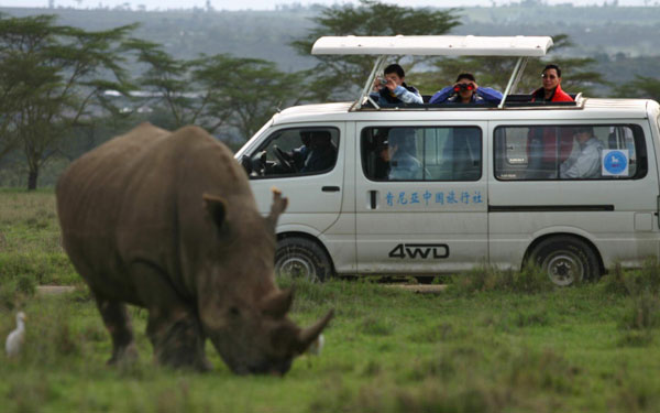 Chinese tourists visit a national park in Kenya, May 2, 2005 file photo.