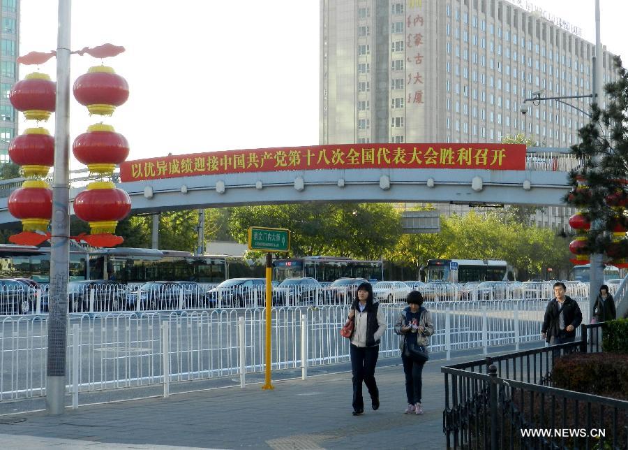 Red lanterns and banners are seen on the street to greet the upcoming 18th National Congress of the Communist Party of China (CPC) in Beijing, capital of China, Oct. 30, 2012. 