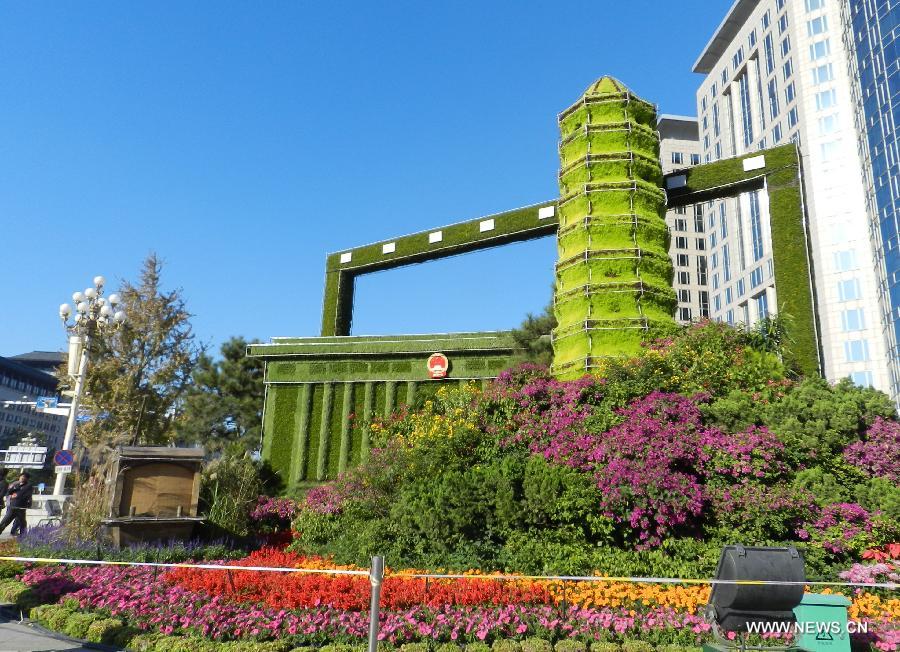 Flower decorations are seen to greet the upcoming 18th National Congress of the Communist Party of China (CPC) in Beijing, capital of China, Oct. 30, 2012.