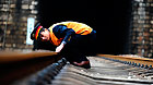 Li Yingming checks the line at the Huangtaishan tunnel in Qimen County, east China's Anhui Province, Oct 30, 2012.