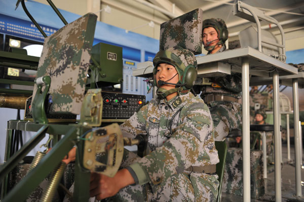 Soldiers take part in a military drill in Lanzhou, Gansu province on April 13, 2011.