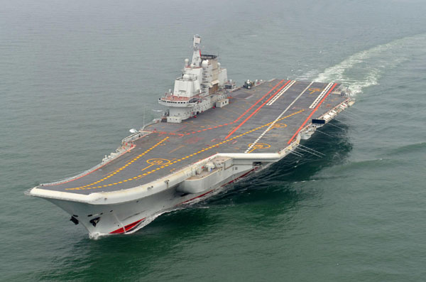 Photo taken in May 2012 shows a Chinese aircraft carrier cruising for a test on the sea.