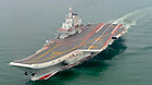 Photo taken in May 2012 shows a Chinese aircraft carrier cruising for a test on the sea.
