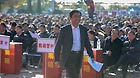 A village party secretary from Yongle County in Tongzhou District in Beijing prepares to deliver his work report to 5,000 village representatives, Oct 31, 2012.