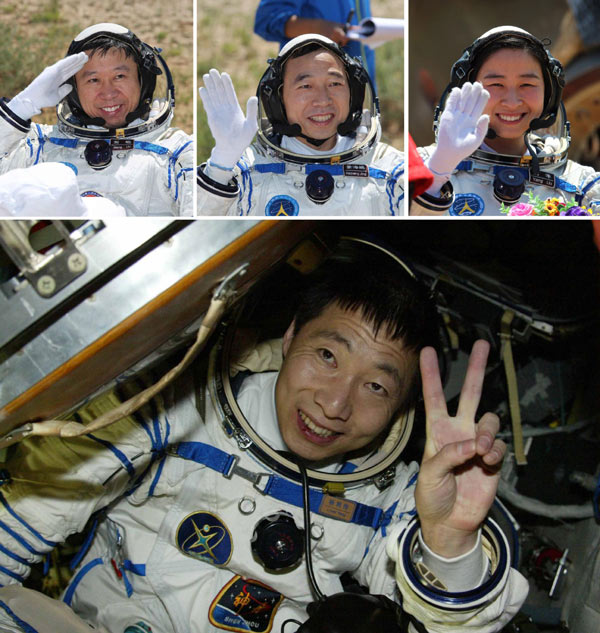 Astronauts Jing Haipeng, Liu Wang and Liu Yang smile and wave after exiting the re-entry capsule of Shenzhou-9 manned spaceship which landed safely in Inner Mongolia Autonomous Region at 10 AM on June 29, 2012.