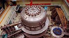 The world's first experimental advanced superconducting tokamak (EAST)nuclear fusion experiment equipment (or 'manmade sun') is designed and made by China in March 2007.