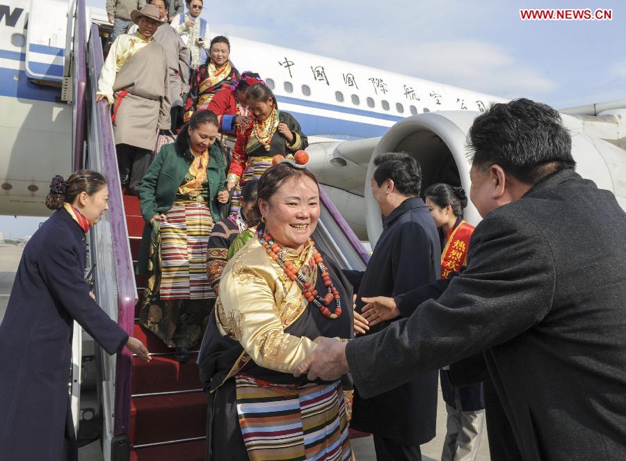 Delegates of the 18th National Congress of the Communist Party of China (CPC) from Tibet Autonomous Region arrive in Beijing, capital of China, on Nov. 5, 2012.