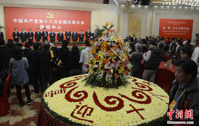 The media center of the 18th National Congress of the Communist Party of China (CPC) holds a reception for domestic and foreign journalists who will cover the congress, at the Beijing Media Center Hotel in Beijing, capital of China, Nov. 6, 2012.