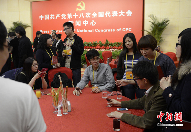 The media center of the 18th National Congress of the Communist Party of China (CPC) holds a reception for domestic and foreign journalists who will cover the congress, at the Beijing Media Center Hotel in Beijing, capital of China, Nov. 6, 2012.