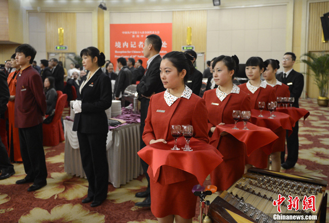 The media center of the 18th National Congress of the Communist Party of China (CPC) holds a reception for domestic and foreign journalists who will cover the congress, at the Beijing Media Center Hotel in Beijing, capital of China, Nov. 6, 2012.