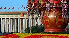 Photo taken on Nov. 8, 2012 shows a flower parterre at the Tian'anmen Square, with the Great Hall of the People in the background, in Beijing, capital of China.