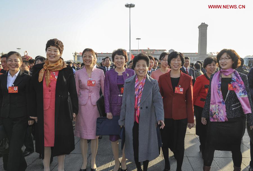 Delegates of the 18th National Congress of the Communist Party of China (CPC) arrive to attend the 18th CPC National Congress at the Great Hall of the People in Beijing, capital of China, Nov. 8, 2012. 