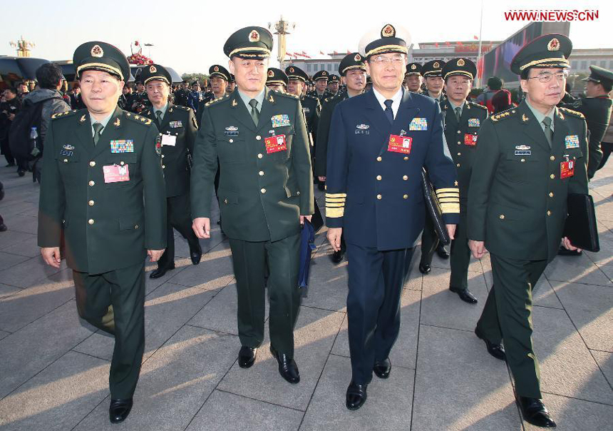 Delegates of the 18th National Congress of the Communist Party of China (CPC) arrive to attend the 18th CPC National Congress at the Great Hall of the People in Beijing, capital of China, Nov. 8, 2012. 