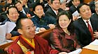 The 11th Panchen Lama, Bainqen Erdini Qoigyijabu (L), attends, as a nonvoting delegate, the opening ceremony of the 18th National Congress of the Communist Party of China (CPC) at the Great Hall of the People in Beijing, capital of China, on Nov. 8, 2012.