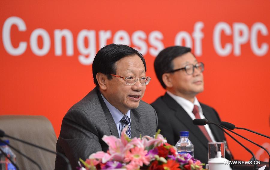 Li Jingtian (L), executive vice president of the Party School of the Communist Party of China (CPC) Central Committee, speaks at a press conference held by the press center of the 18th CPC National Congress on CPC theory innovation in Beijing, capital of China, Nov. 9, 2012.