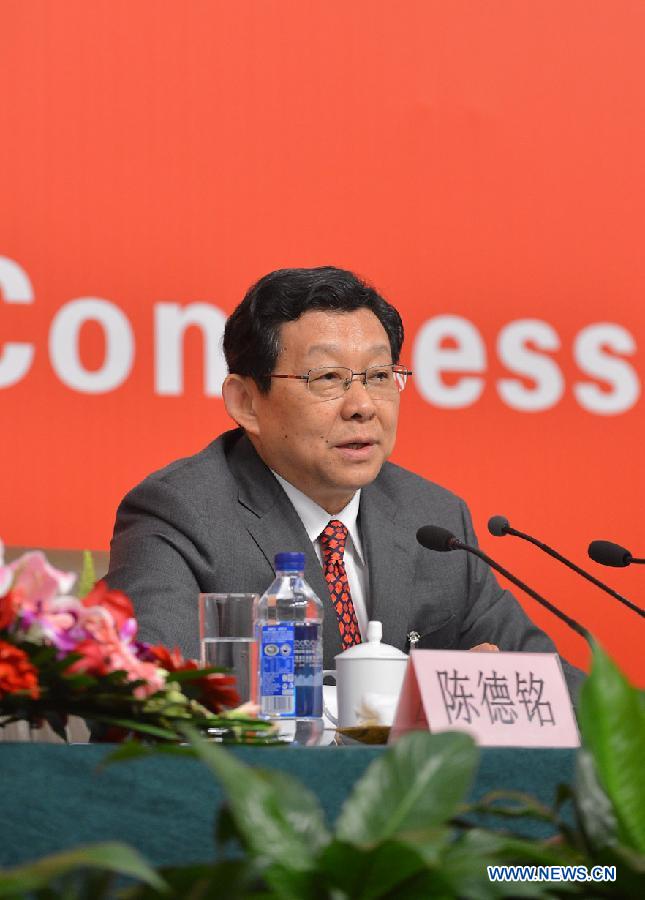 Chinese Minister of Commerce Chen Deming receives interview at the press center of the 18th National Congress of the Communist Party of China (CPC) in Beijing, capital of China, Nov. 10, 2012. 