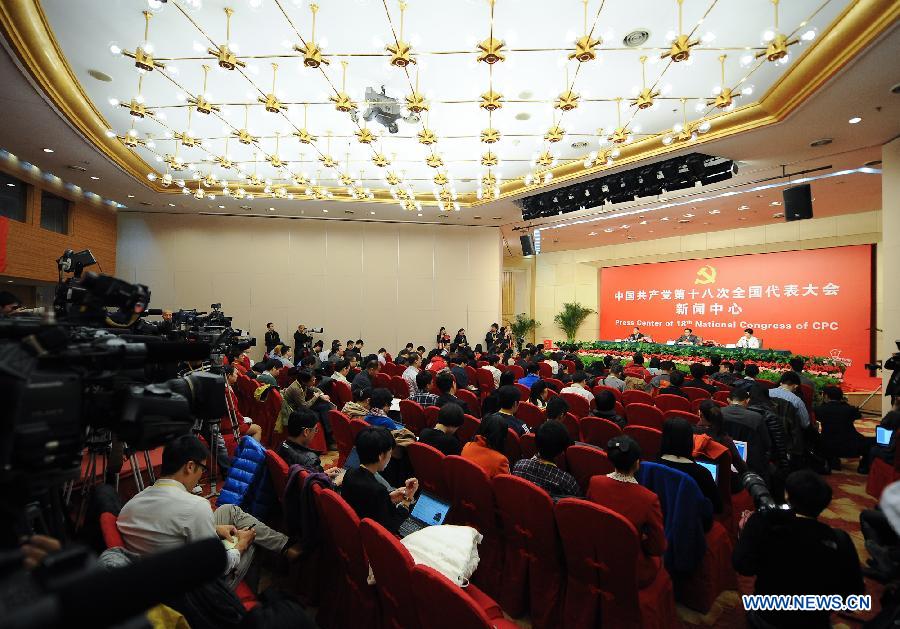 Chinese Minister of Commerce Chen Deming receives interview at the press center of the 18th National Congress of the Communist Party of China (CPC) in Beijing, capital of China, Nov. 10, 2012.