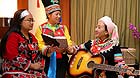The delegate from the Lahu ethnic group Li Naluo (Right), the delegate from the Blang ethnic group Yang Ziqin (Center) and the delegate from the Va ethnic group Chen Fengxian perform Li's self-composed song 'Thanks to the CPC' in Beijing on Nov 10, 2012.