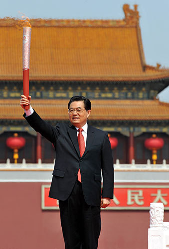 Chinese President Hu Jintao is present at the welcoming ceremony for the Olympic flame and launching of the Beijing Olympic torch relay at Tian'anmen Square in Beijing on Mar. 31, 2008.