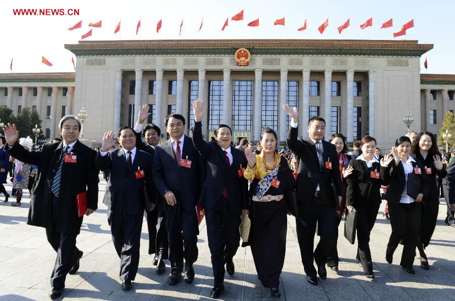 Delegates leave after the closing session of the 18th National Congress of the Communist Party of China (CPC) at the Great Hall of the People in Beijing, capital of China, Nov. 14, 2012.