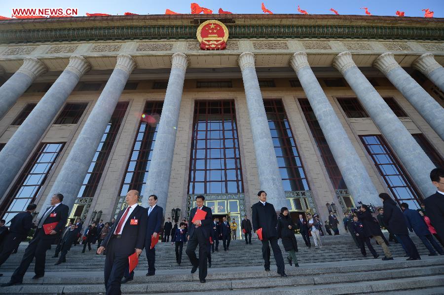 Delegates leave after the closing session of the 18th National Congress of the Communist Party of China (CPC) at the Great Hall of the People in Beijing, capital of China, Nov. 14, 2012.