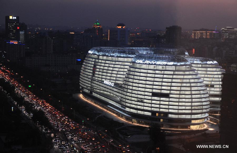 Photo taken on Nov. 14, 2012 shows the exterior of Galaxy Soho building in Beijing, capital of China.