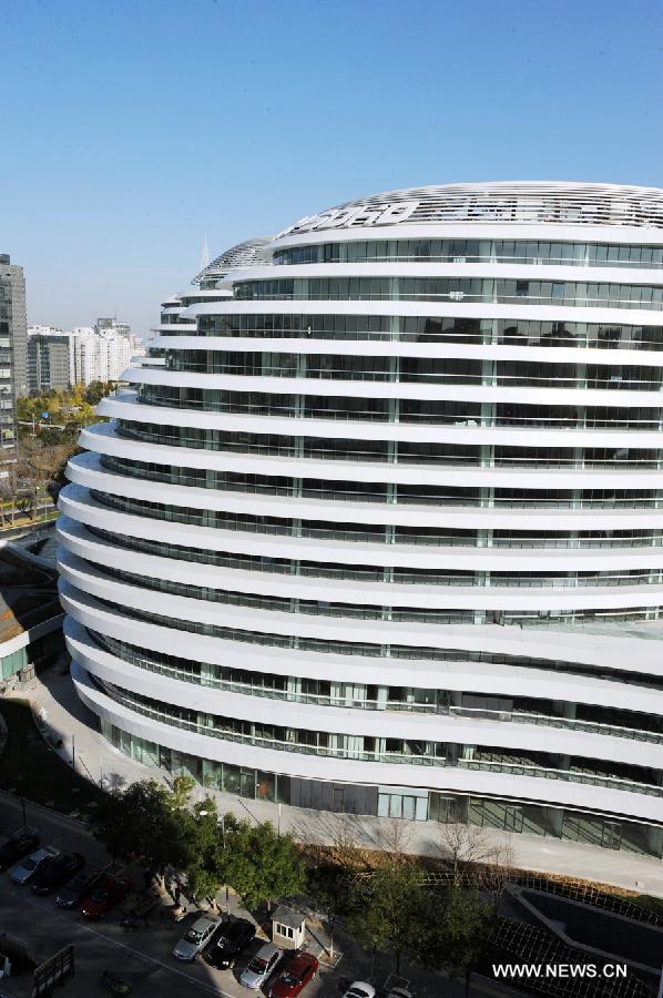 Photo taken on Nov. 14, 2012 shows the exterior of Galaxy Soho building in Beijing, capital of China.