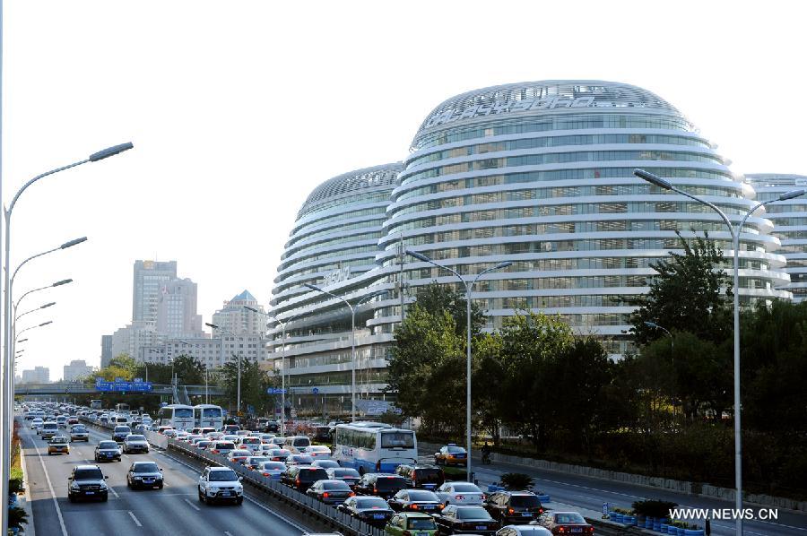 Photo taken on Nov. 14, 2012 shows the exterior of Galaxy Soho building in Beijing, capital of China.