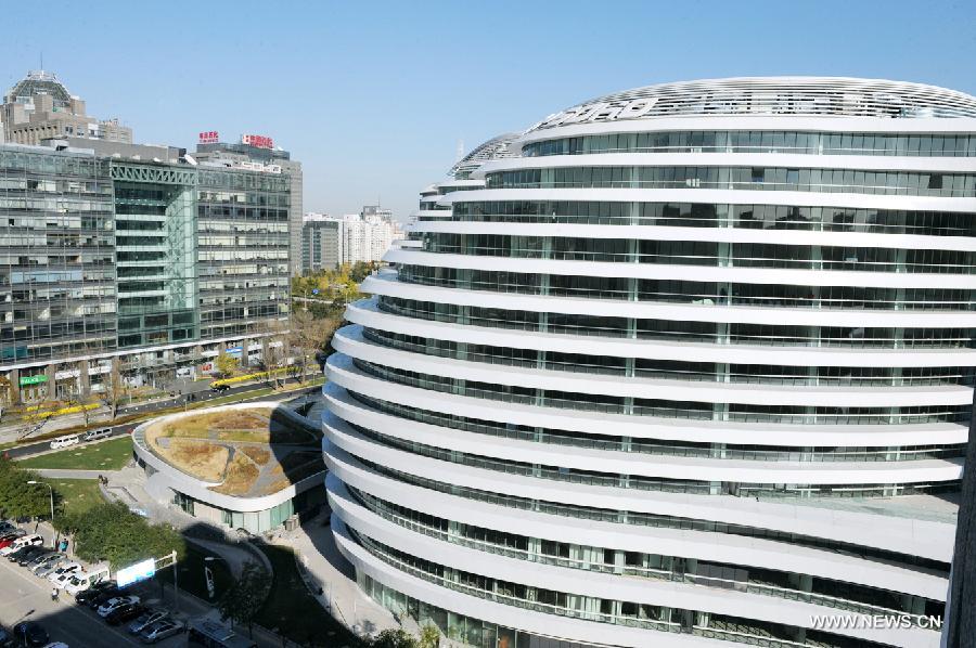 Photo taken on Nov. 14, 2012 shows the exterior of Galaxy Soho building in Beijing, capital of China.