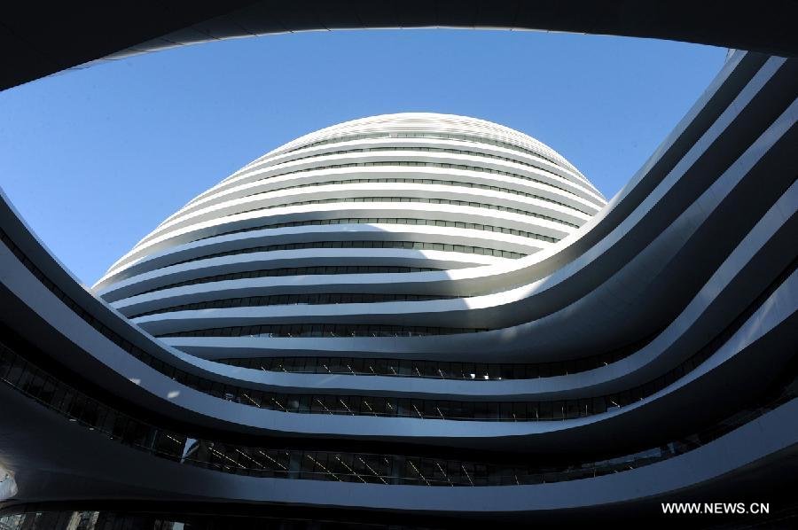 Photo taken on Nov. 14, 2012 shows the exterior of Galaxy Soho building in Beijing, capital of China.