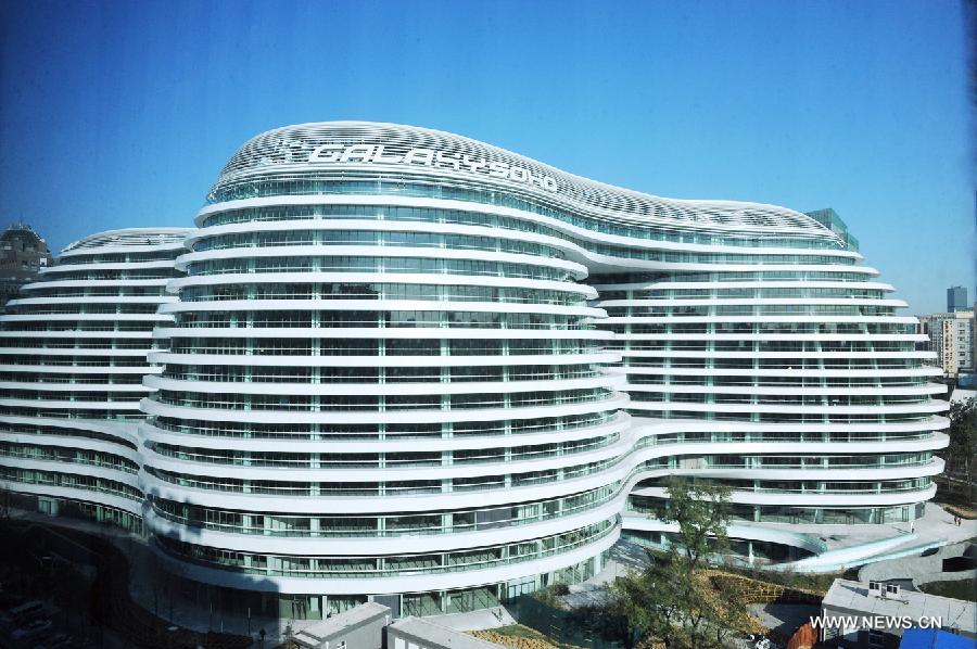 Photo taken on Nov. 14, 2012 shows the exterior of Galaxy Soho building in Beijing, capital of China.