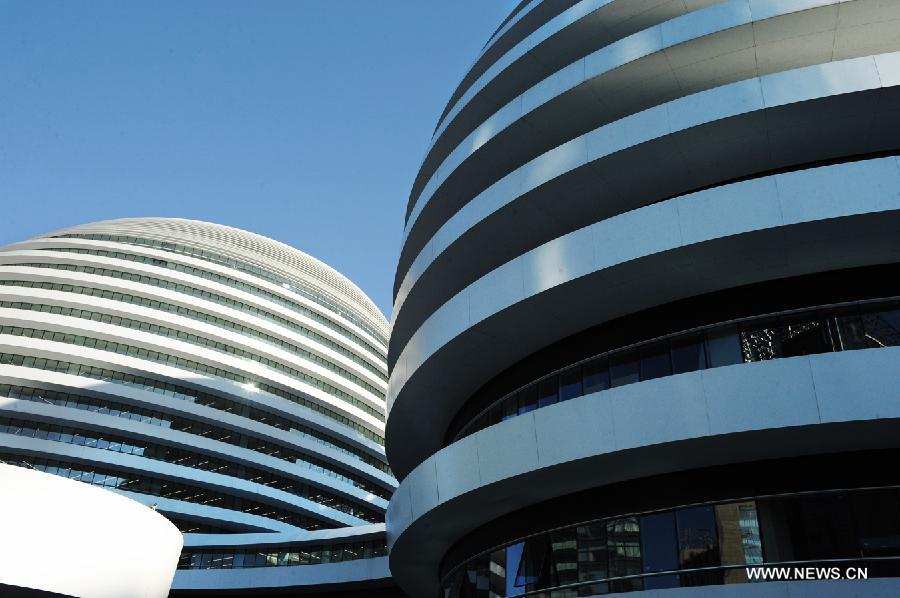 Photo taken on Nov. 14, 2012 shows the exterior of Galaxy Soho building in Beijing, capital of China.