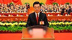 Hu Jintao casts his ballot during the closing session of the 18th National Congress of the Communist Party of China (CPC) at the Great Hall of the People in Beijing, capital of China, Nov. 14, 2012.