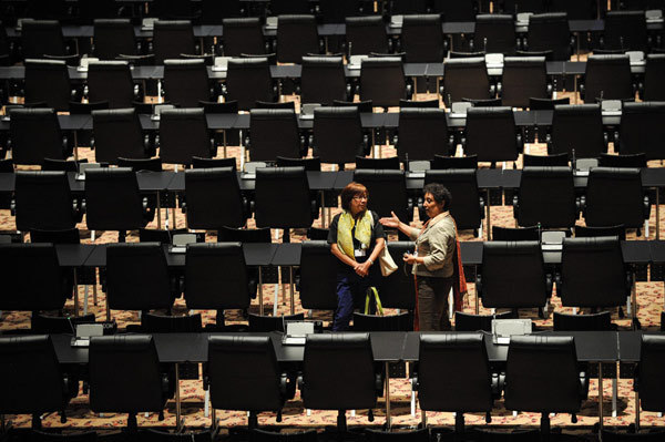 Staff check the assembly room in Doha on Nov 25, 2012