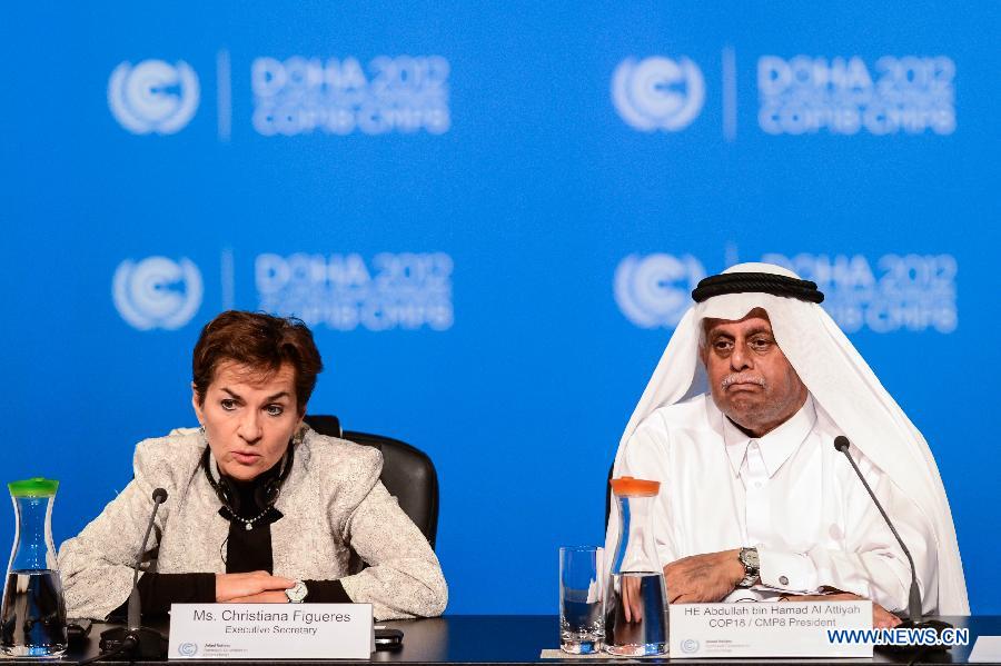 H.E. Abdullah Bin Hamad Al Attiyah (R), president of the 18th Conference of the Parties (COP18) to the United Nations Framework Convention on Climate Change (UNFCCC), and UNFCCC Executive Secretary Christiana Figueres attend a joint press conference at the Qatar National Convention Center (QNCC) in Doha, Qatar, Dec. 8, 2012. 