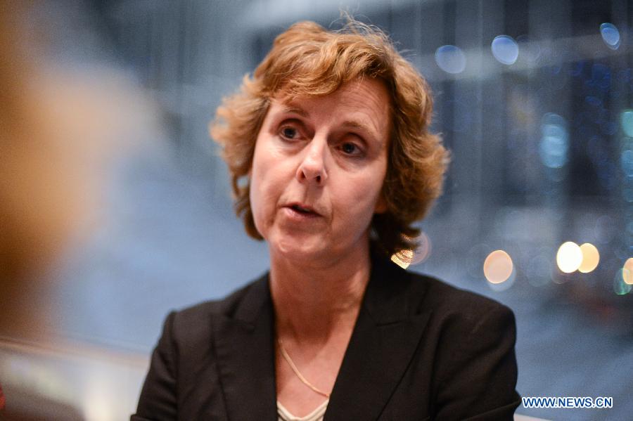 The European Union Climate Commissioner Connie Hedegaard speaks to the media at the Qatar National Convention Center (QNCC) in Doha, Qatar, Dec. 8, 2012. 