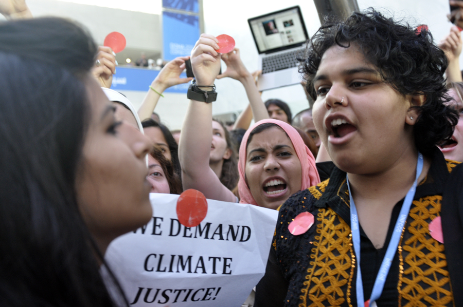 Over a hundred campaigners from non-governmental organizations gathered in outrage under the spider sculpture at Qatar National Convention Centre on December 7, calling for justice, ambition and finance in support of developing countries as two weeks of climate talks may produce the text that fails the planet. 