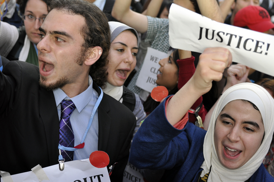 Over a hundred campaigners from non-governmental organizations gathered in outrage under the spider sculpture at Qatar National Convention Centre on December 7, calling for justice, ambition and finance in support of developing countries as two weeks of climate talks may produce the text that fails the planet. 