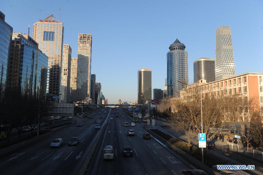 VVehicles move on the Jianguo Road in Beijing, capital of China, Feb. 1, 2013. 