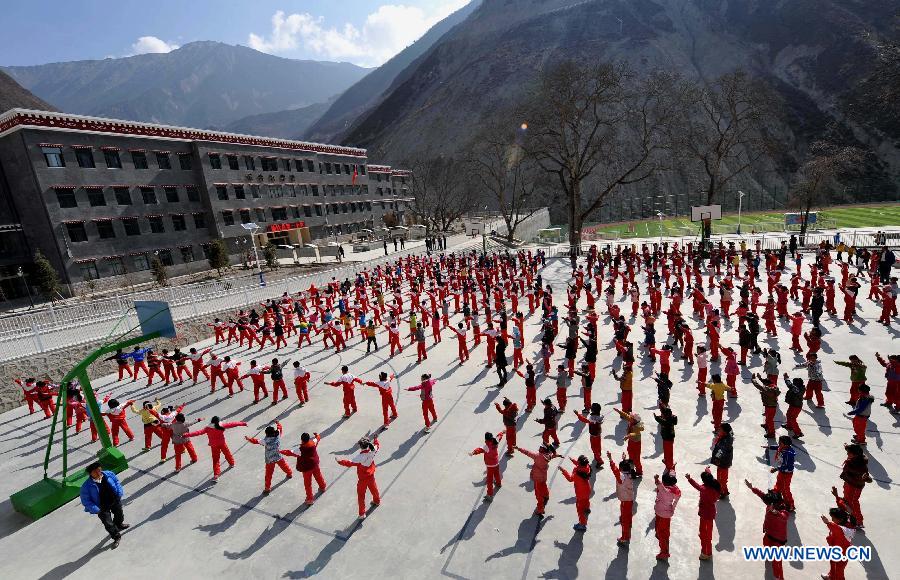 Pupils do exercises at No. 1 Primary School of Deqin County in Diqing Tibetan Autonomous Prefecture, southwest China's Yunnan Province, March 12, 2013. 