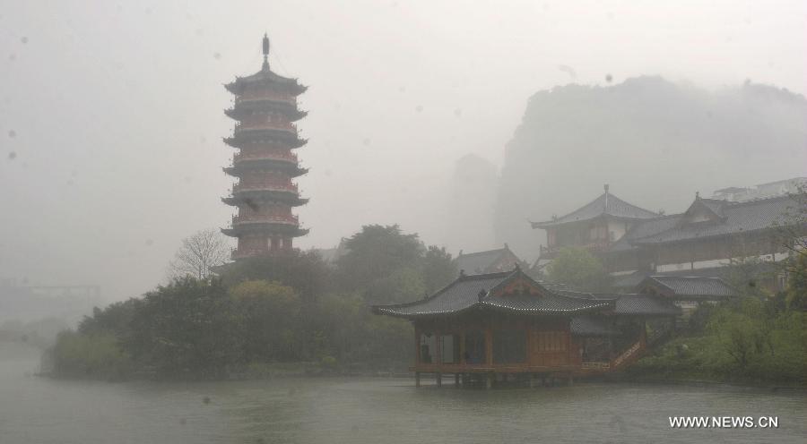 Photo taken on March 17, 2013 shows a pagoda in light fog in Guilin, southwest China's Guangxi Zhuang Autonomous Region. 