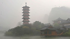Photo taken on March 17, 2013 shows a pagoda in light fog in Guilin, southwest China's Guangxi Zhuang Autonomous Region.