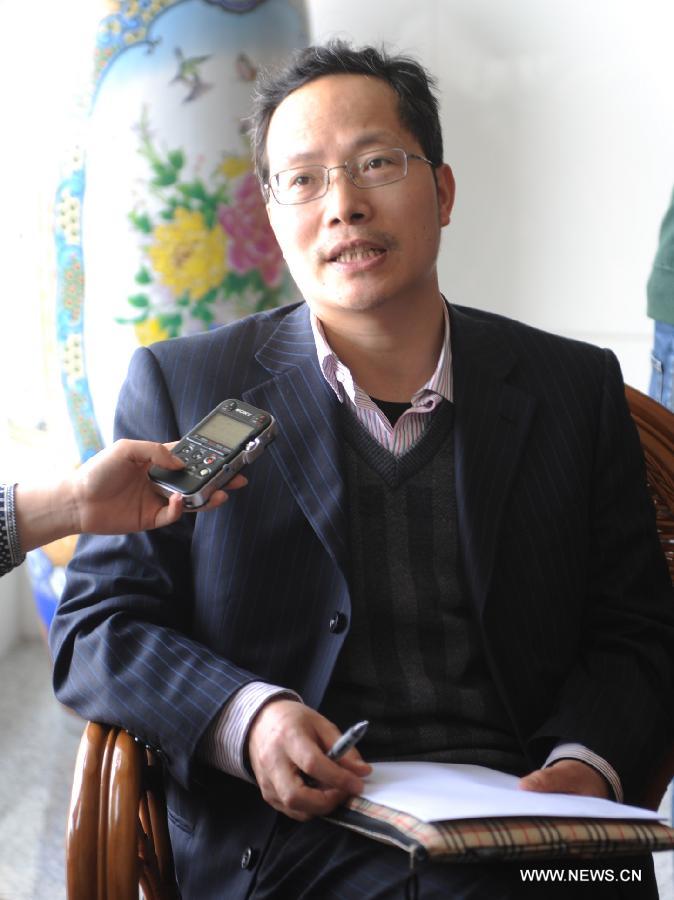 Bao Changjun, deputy director of the Institute for Acute Infectious Diseases in Jiangsu Provincial Center for Disease Control and Prevention, receives an interview on H7N9 bird flu virus in Nanjing, capital of east China's Jiangsu Province, April 1, 2013.