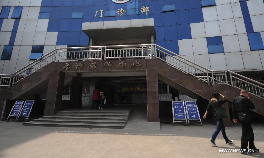 Photo taken on April 1, 2013 shows the clinic building which received a patient contracting H7N9 bird flu virus in Nanjing, capital of east China's Jiangsu Province. 