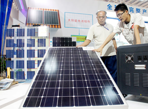 Solar panels on display at an expo in Haikou, Hainan Province. A Ministry of Commerce official said the European Commission has been using the solar panel case as a bargaining chip to seek compromise from China in specific sectors, such as telecoms.