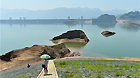 Islands appear as the water level of the Three Gorges Dam dropped to 149.97 meters in Yichang City, Hubei Province, on June 2, 2013. The water level of the China's largest water control and hydropower project is set to fall below 146.5 meters before June 10, when major floods around the Yangtze River are expected.