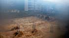 A building site is flooded in Gaoluo Township, Xuan'en County, Enshi Tujia and Miao Autonomous Prefecture of central China's Hubei Province, June 6, 2013.