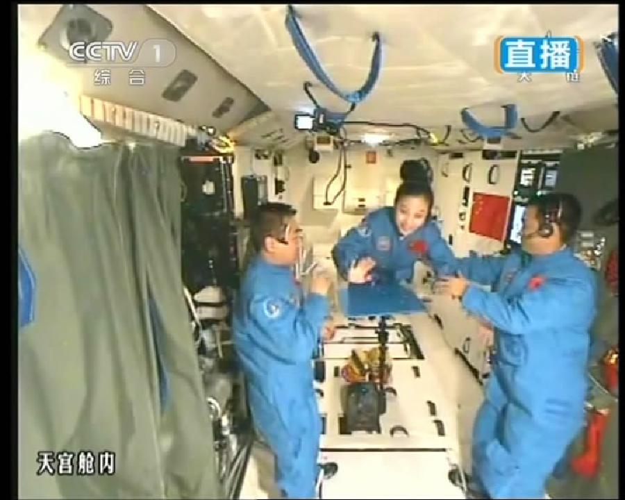 This TV grab taken on June 20, 2013 shows female astronaut Wang Yaping (R), one of the three crew members of Shenzhou-10 spacecraft, giving a lecture to students on Earth aboard China's space module Tiangong-1. This TV grab taken on June 20, 2013 shows female astronaut Wang Yaping (R), one of the three crew members of Shenzhou-10 spacecraft, giving a lecture to students on Earth aboard China's space module Tiangong-1.